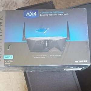 NETGEAR AX4 AX3000 Wi‑Fi 6 Router in Black and Blue Box